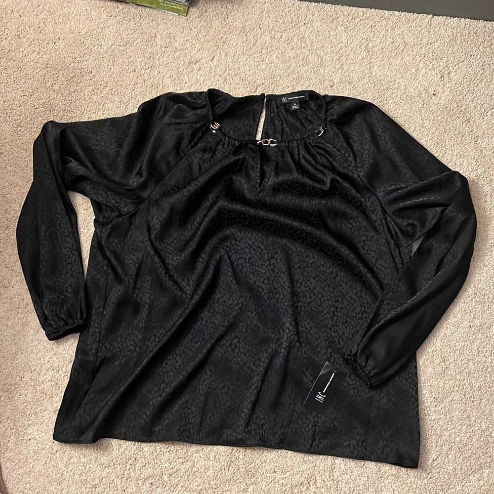 Black top with gold chain detail